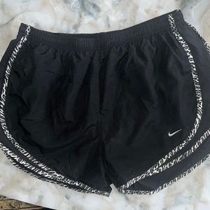 Nike black Dri-Fit women’s shorts with cheetah print detail
